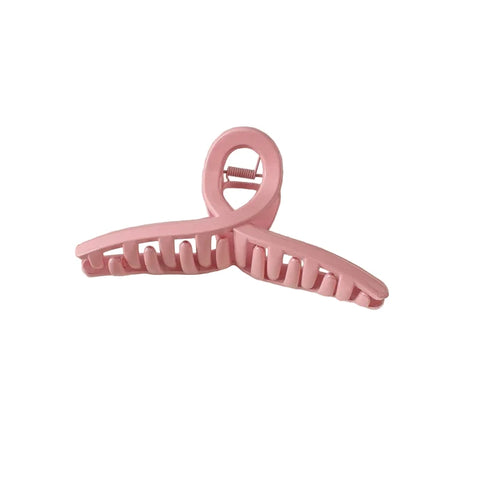 Pastelowa klamra do włosów o skręconej formie - Spinkarnia